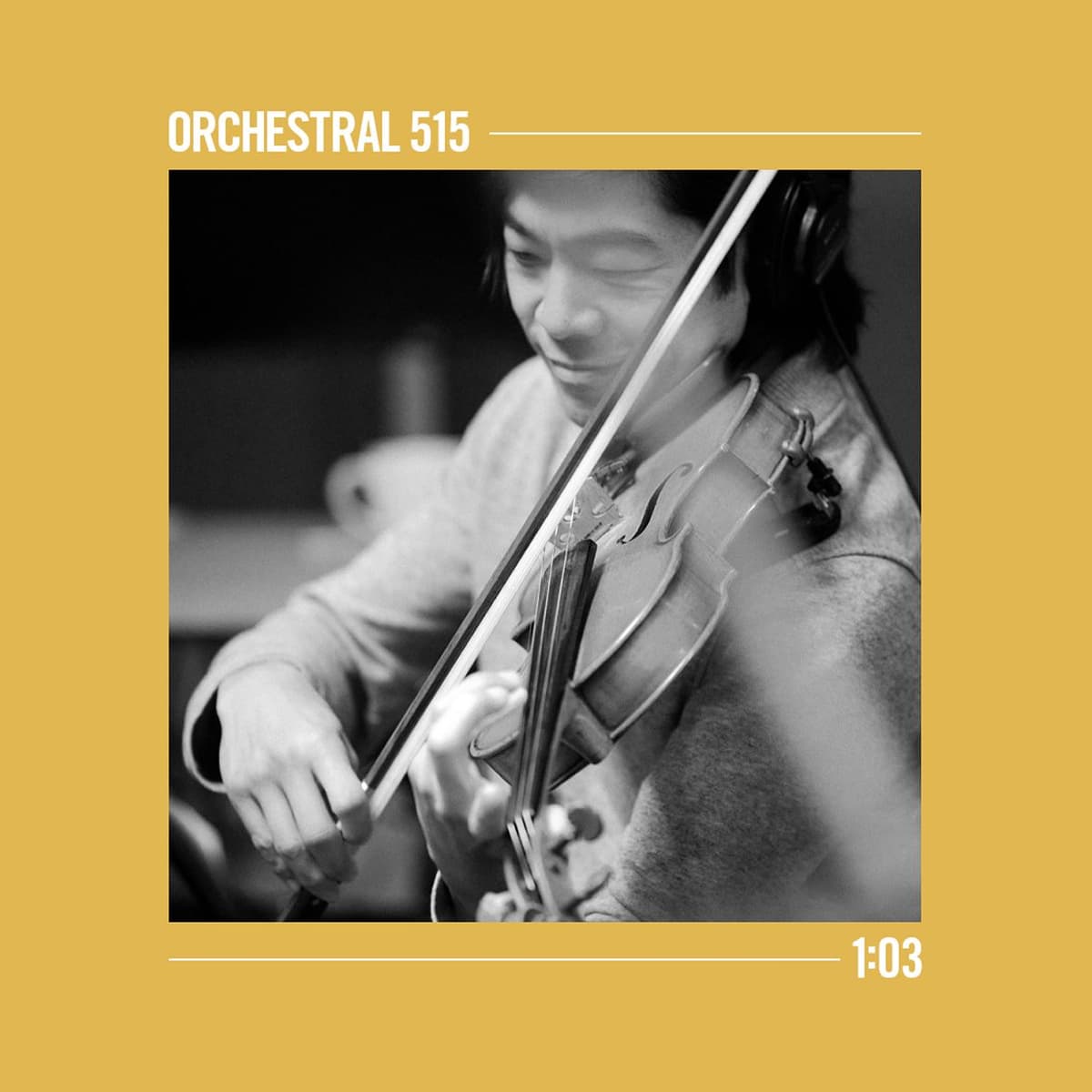 Black and white photo of a person playing the violin, wearing headphones, framed by a mustard yellow border with the text "ORCHESTRAL 515" at the top left and "1:03" at the bottom right.